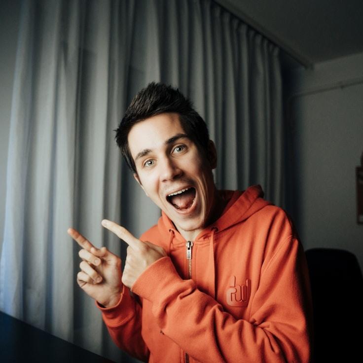 Kaveri Mehta, Lead Design Curator at Star Light Garden Network, reviewing corporate floral arrangements